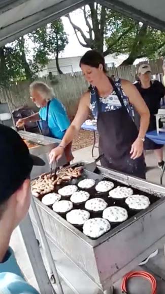 Flipping pancakes Wellborn Blueberry Festival 2021